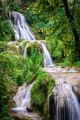 A Small Waterfall Shot A Slow Shutter With A Small Tree Canvas Print