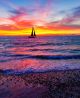 A Colorful Ocean Sunset Sky as a Gentle Wave Canvas Print