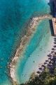 Aerial View of a Beach with Blue Clear Water Canvas Print